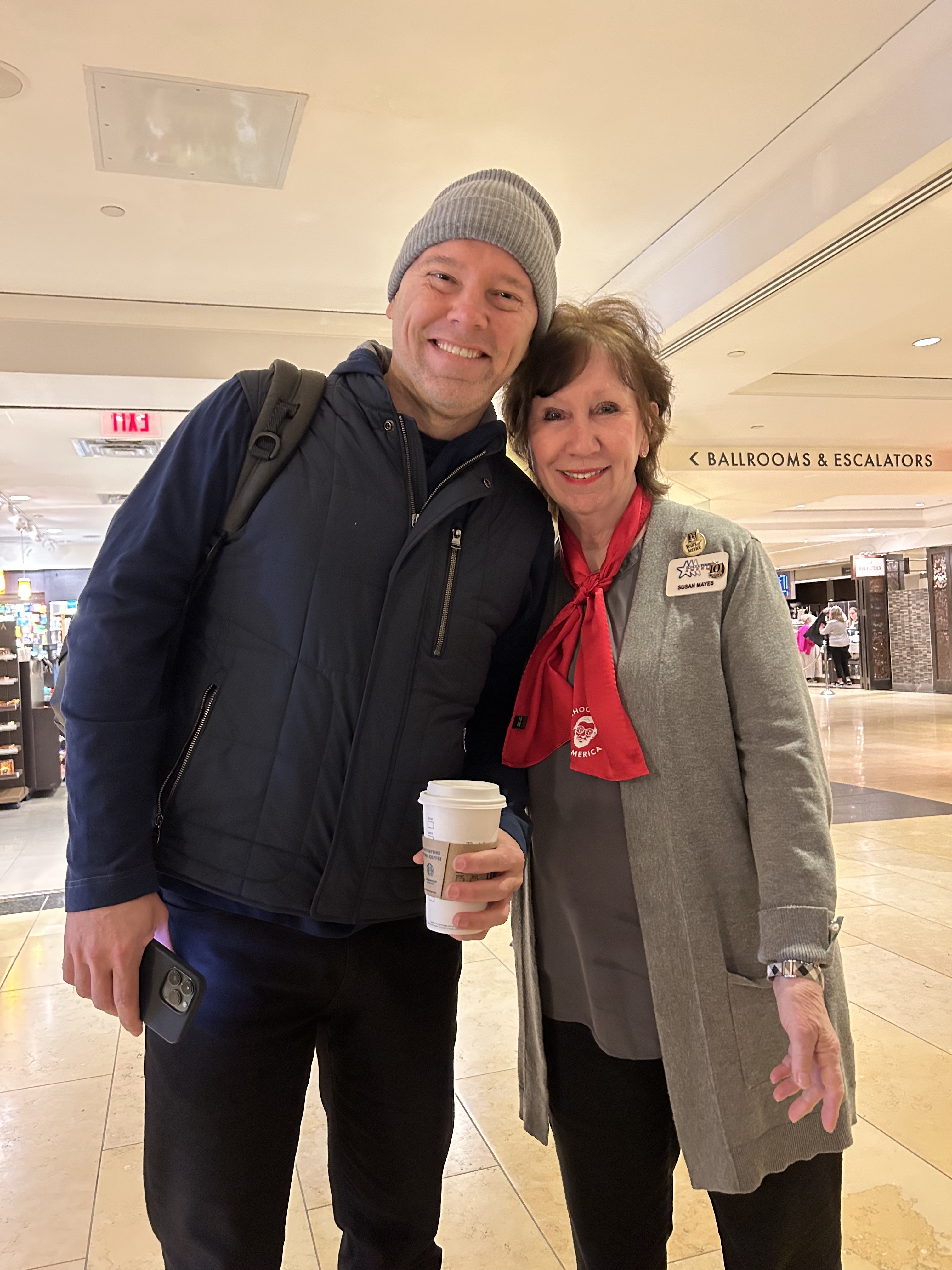 A School Tours of America Tour Host poses with a New York City tour guide.