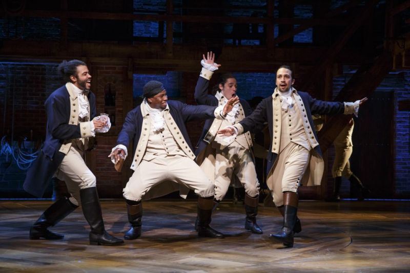 Hamilton Broadway Play in action with Lin-Manuel Miranda and cast members